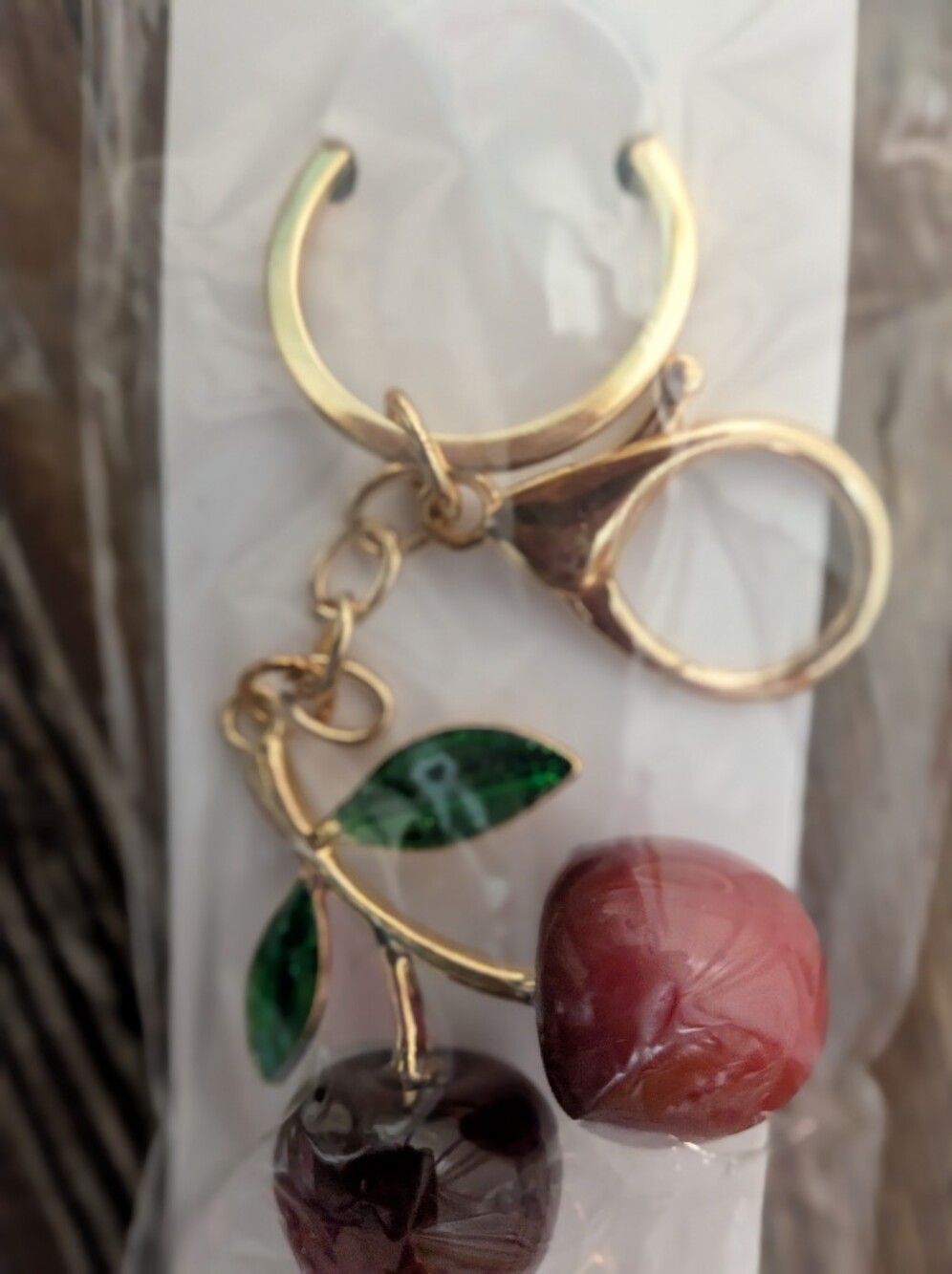 Gold-Tone Cherry Keychain with Red and Green Accents